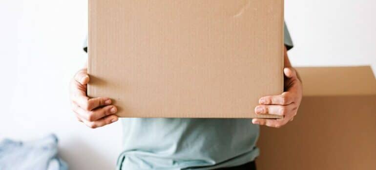 man holding a box