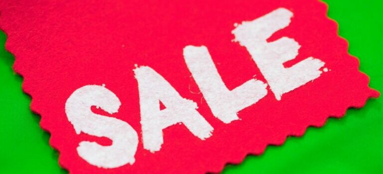 "sale" on the piece of cloth