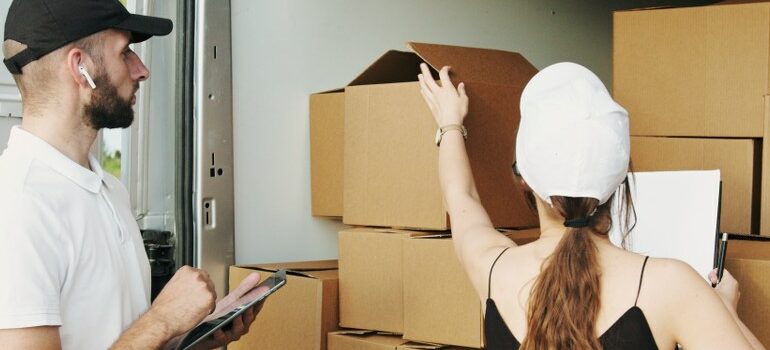 apartment movers Austin counting boxes