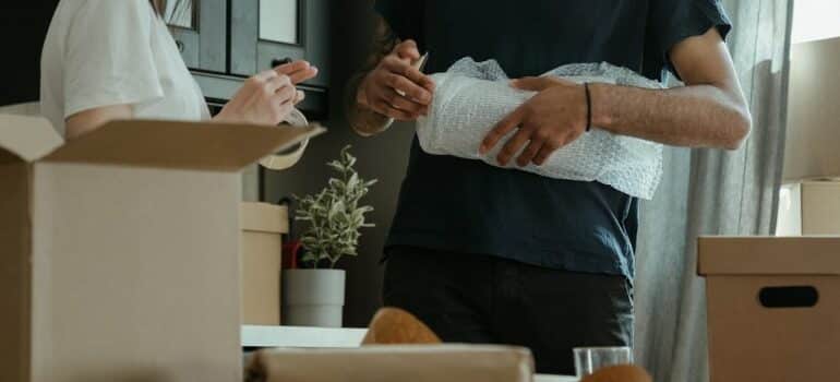 people packing for the relocation