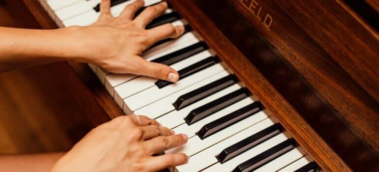 Person playing a piano