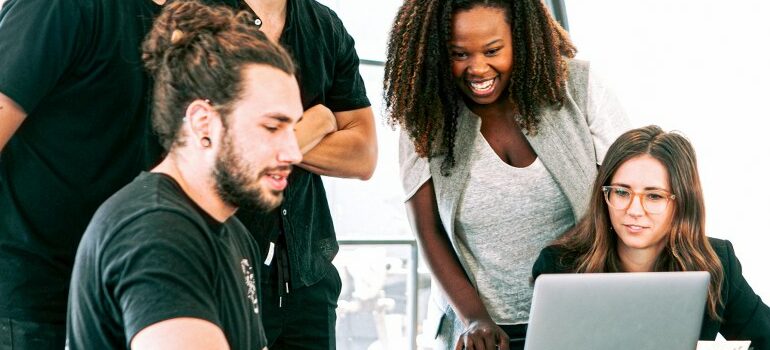 group of movers Georgetown working in the office