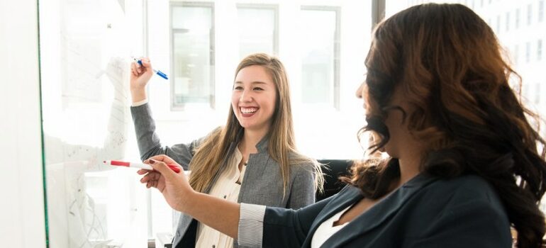 movers kyle drawing on a whiteboard