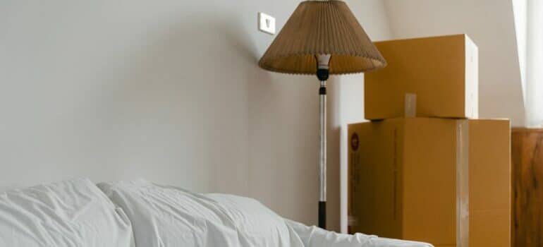 Packed living room ready for movers Brushy Creek to transport the boxes