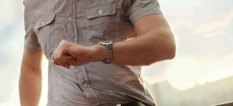 a man looking at his watch