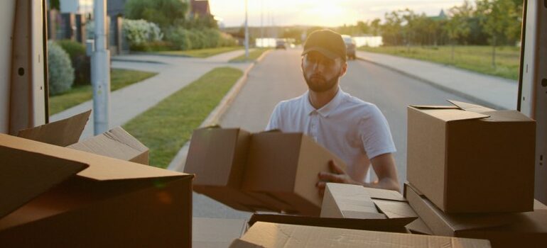 professional mover loading a moving van
