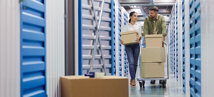 two people in a climate controlled storage Austin
