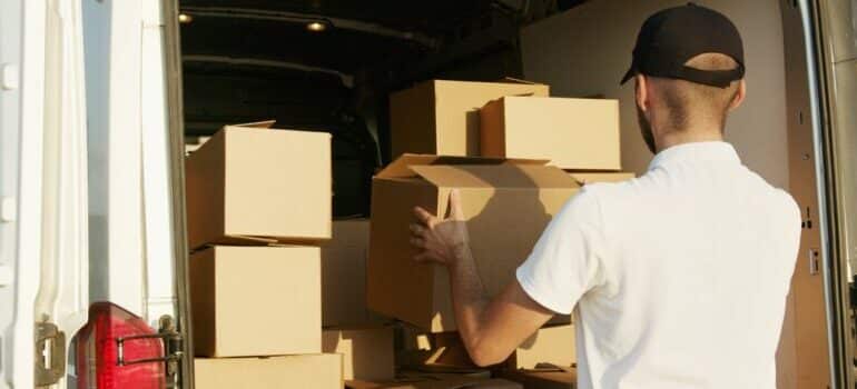 man loading the moving van