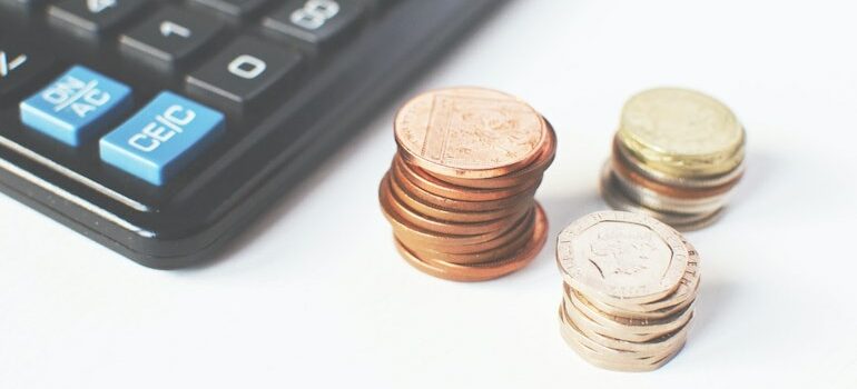 coins next to the calculator