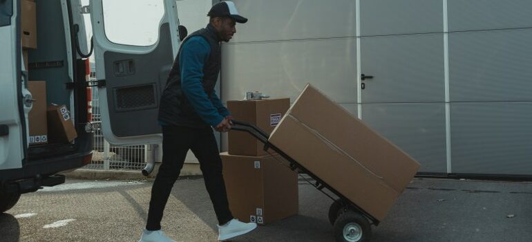 storage pickup and delivery using a dolly