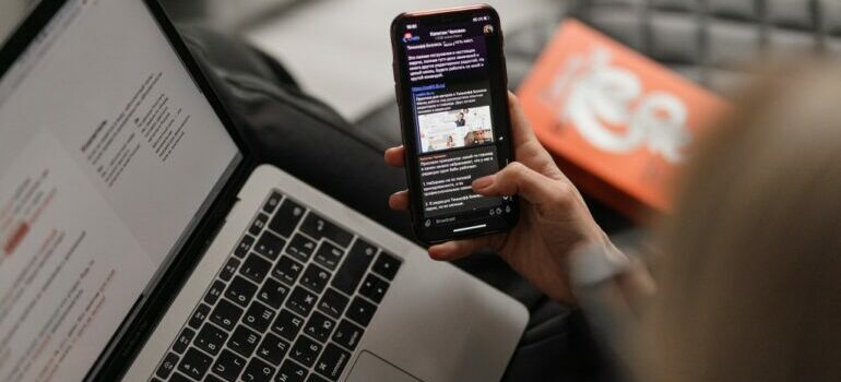 woman sending out emails to business clients