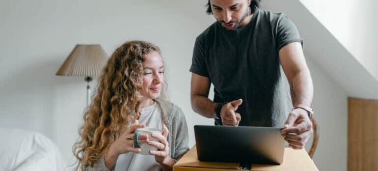 man woman and computer