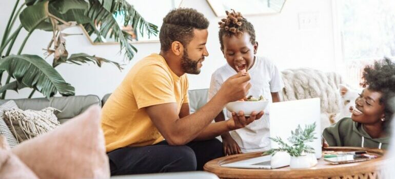 a family enjoying their childproof home after moving