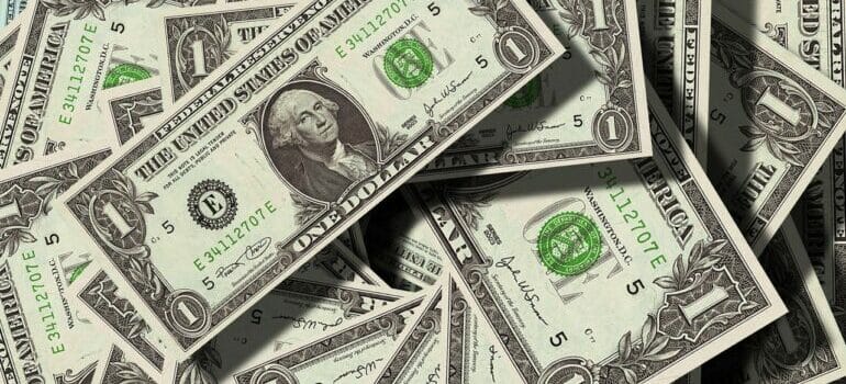A pile of dollars that can remain in your pocket of you manage to avoid hidden costs of moving