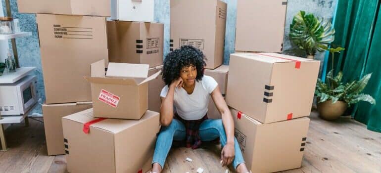 Young woman moving home