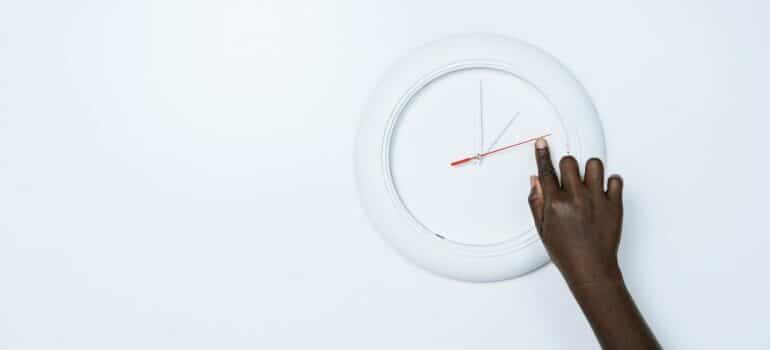 watch on the wall representing best time to move business