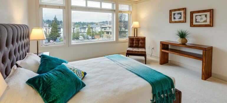 a staged bedroom inside a suburban home