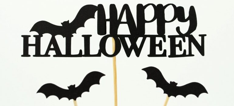 a sign that says "Happy Halloween"