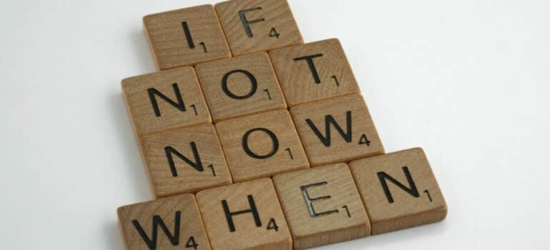 wooden blocks with letters on them forming words