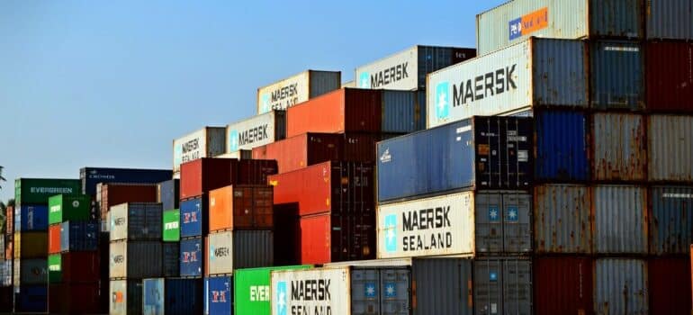 a large number of containers stacked on one another