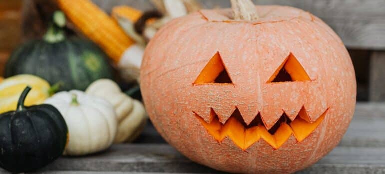 a carved Halloween pumpkin on the table