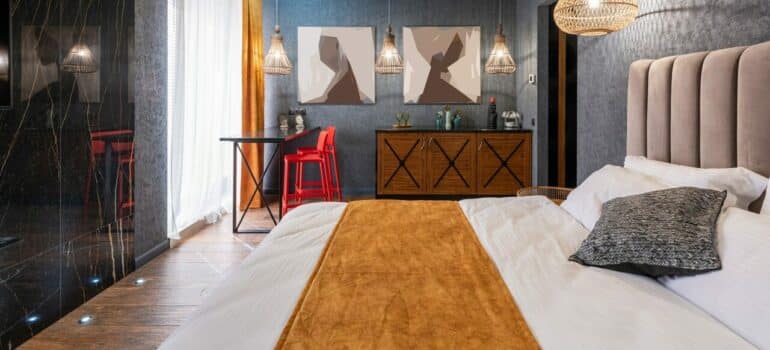 a bedroom with a large bed and other furniture in it