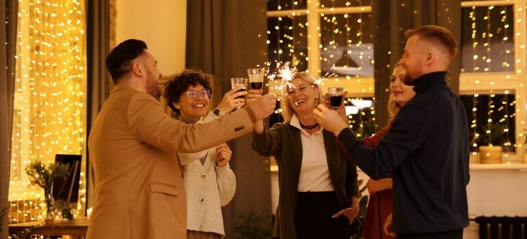 a group of people drinking wine