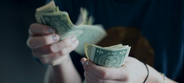 person counting money