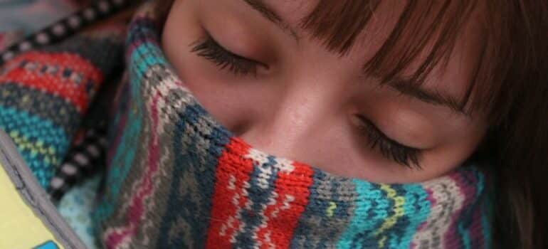 Woman sleeping with a scarf