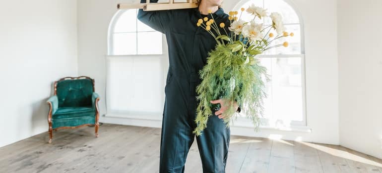 person holding items for storage