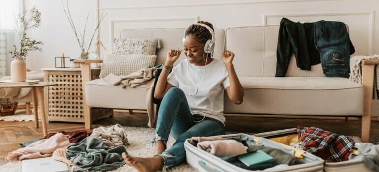 Woman packing and moving as a student in Texas