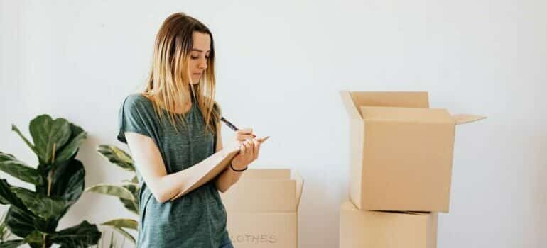 woman packing boxes