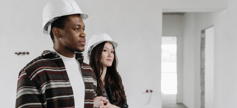 a couple going to prepare new home for your arrival