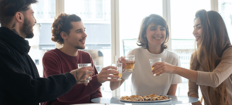 people eating and drinking