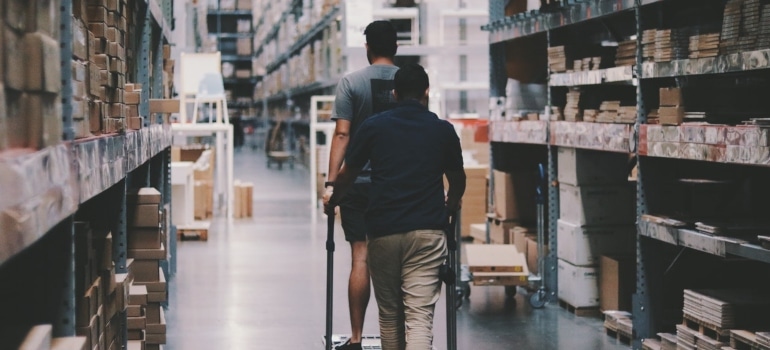 two men in the storage