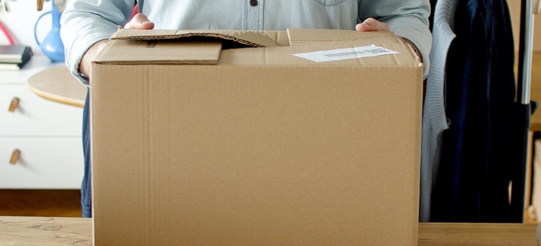 a person holding a box
