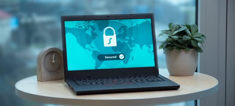 A computer is on a desk.