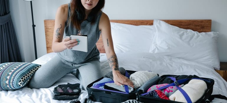 A woman is looking at a list.