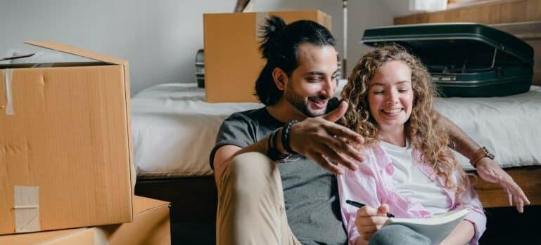 A couple making plans before moving in together