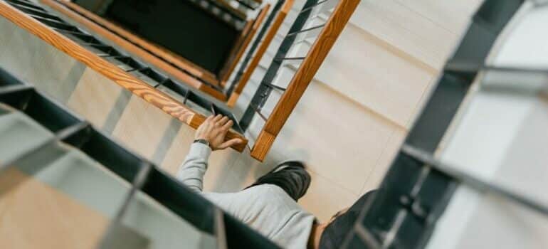 man going up the stairs