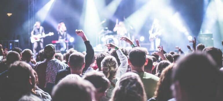 Visiting a music event full of people after starting a new life in Austin