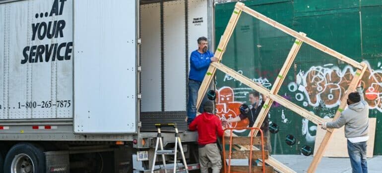people loading a moving truck