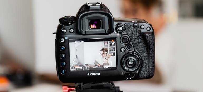 Camera recoding a video in an office;