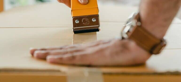 Man following packing tips for moving to college