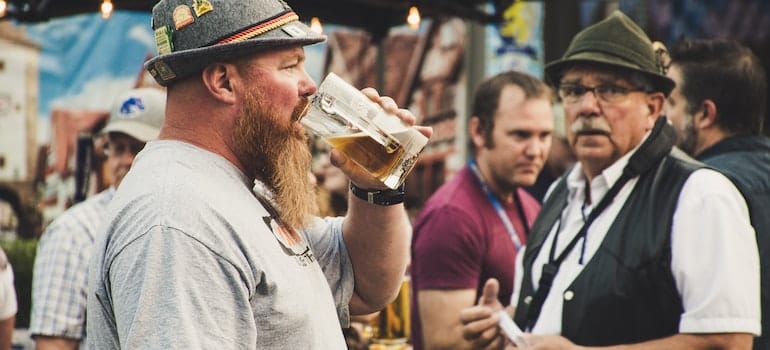 Man Drinking from a Beer Pint.