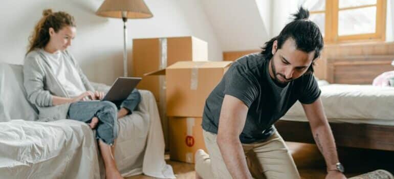 A couple moving while working remotely