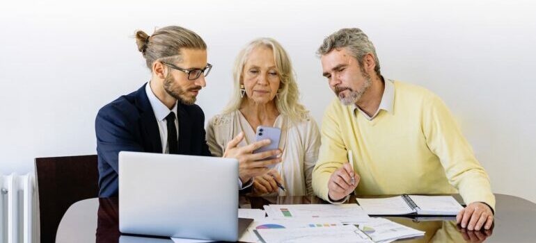 Property manager with his new tenants