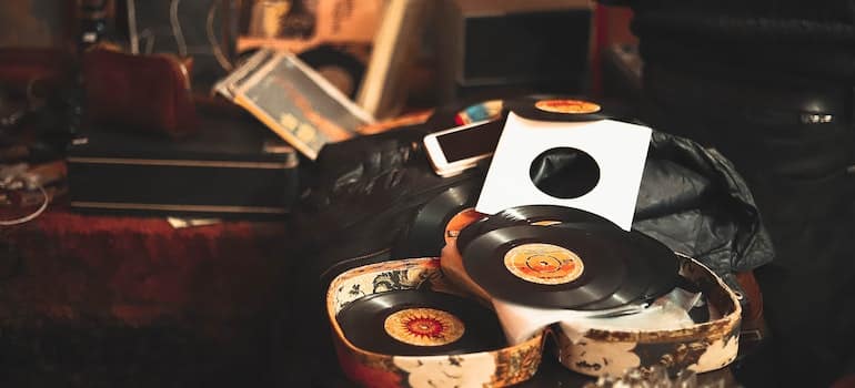 Vinyl sleeves in open brown case found while packing the attic before moving.