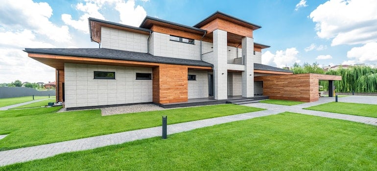 A house with a large green lawn