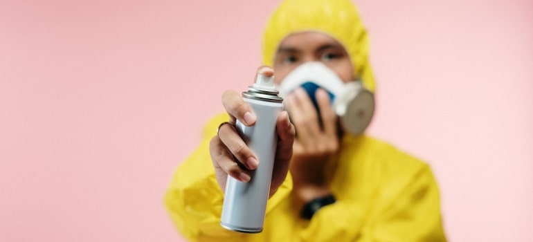 a person following a guide to cleaning the storage unit